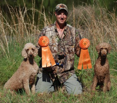 Cooper and Layla with their rosettes.